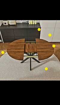 Extendable retractable round dining table £408 Order number 048