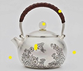 Fine sterling silver teapot with intricate butterfly carvings £2800 order number 588