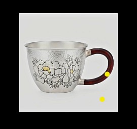 Sterling hammered silver teacup with intricate carvings £1500 order number 055