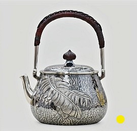 Sterling silver teapot with banana leaf relief £4008 Order number 548